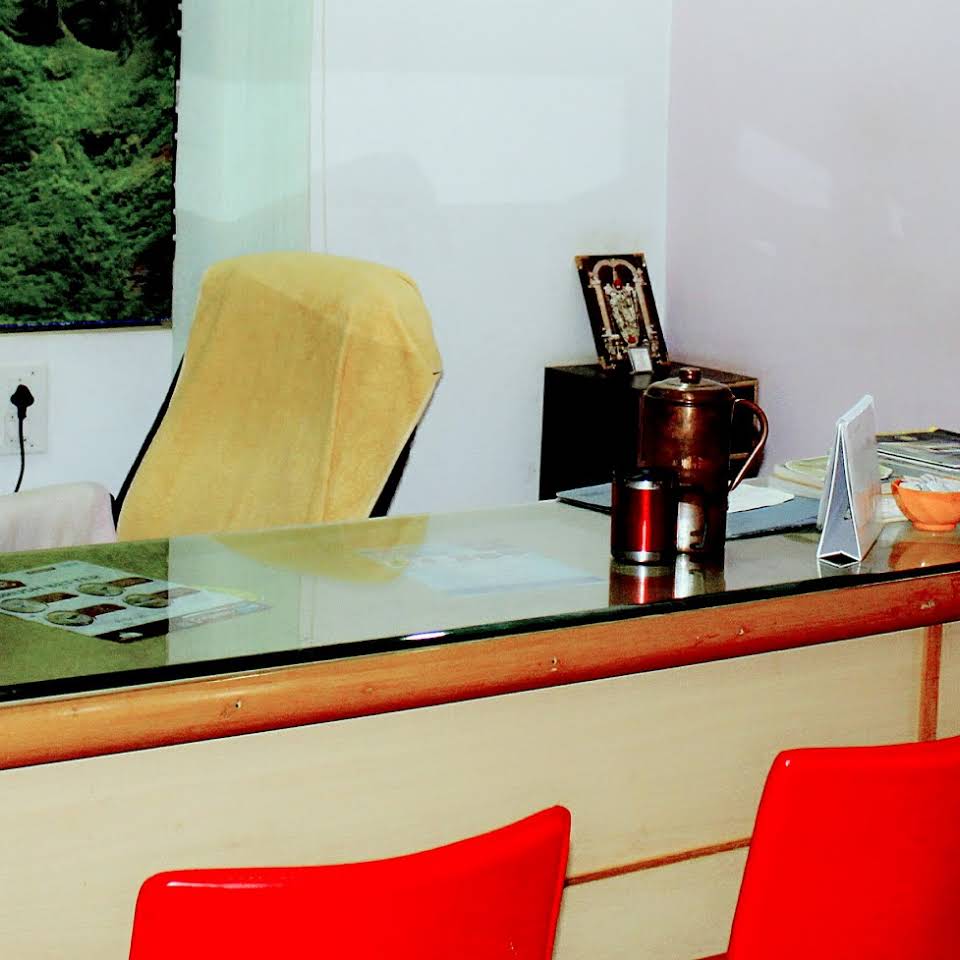 Suraksha Speciality Dental Care - Dr Deepak Mohan